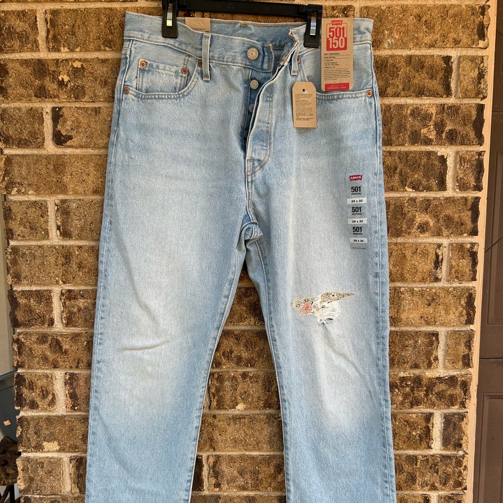 Levi's women’s Distressed Light Blue Straight Jeans